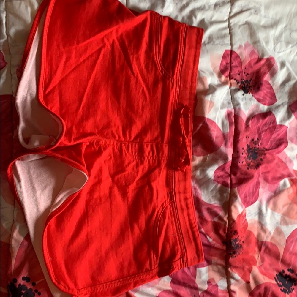 Red mid rise shorts